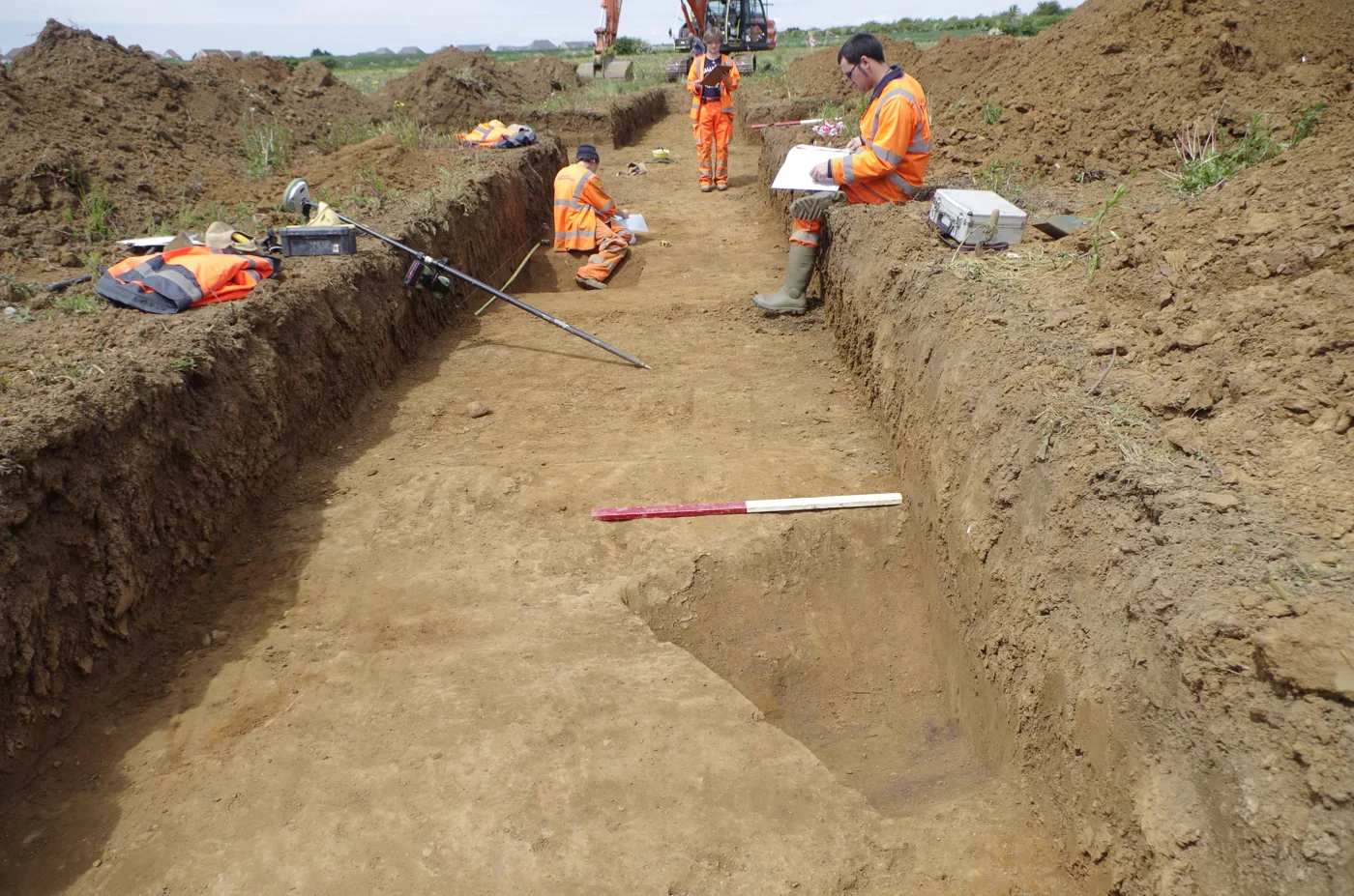 Archaeologists dig evaluation trenches in farmland beside the A43 near Moulton, on the northern edge of Northampton. The picture does not show a specific site in the plan.